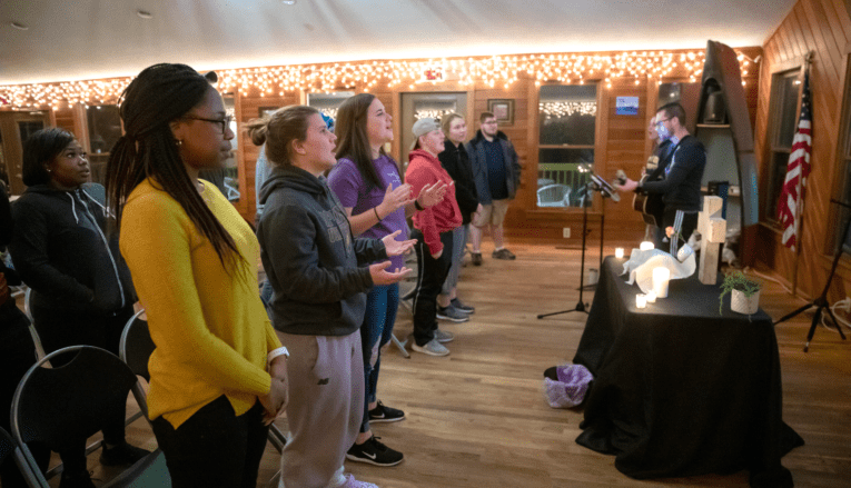 students standing and singing