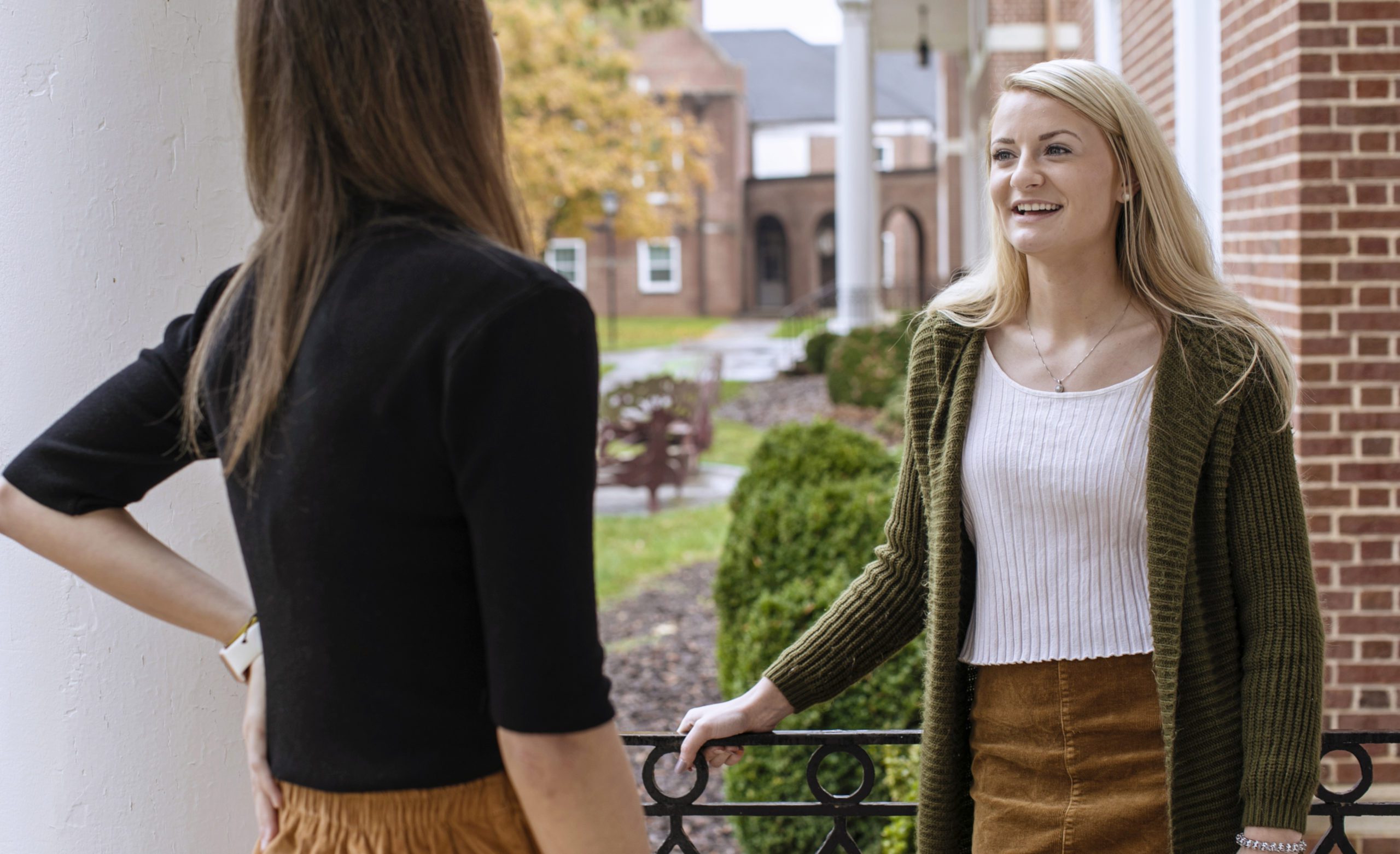 Two students talking outside