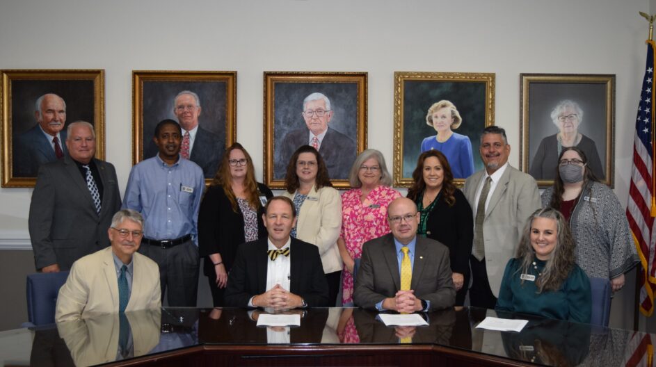 Officials of Pfeiffer and Montgomery Community College Signing Agreement